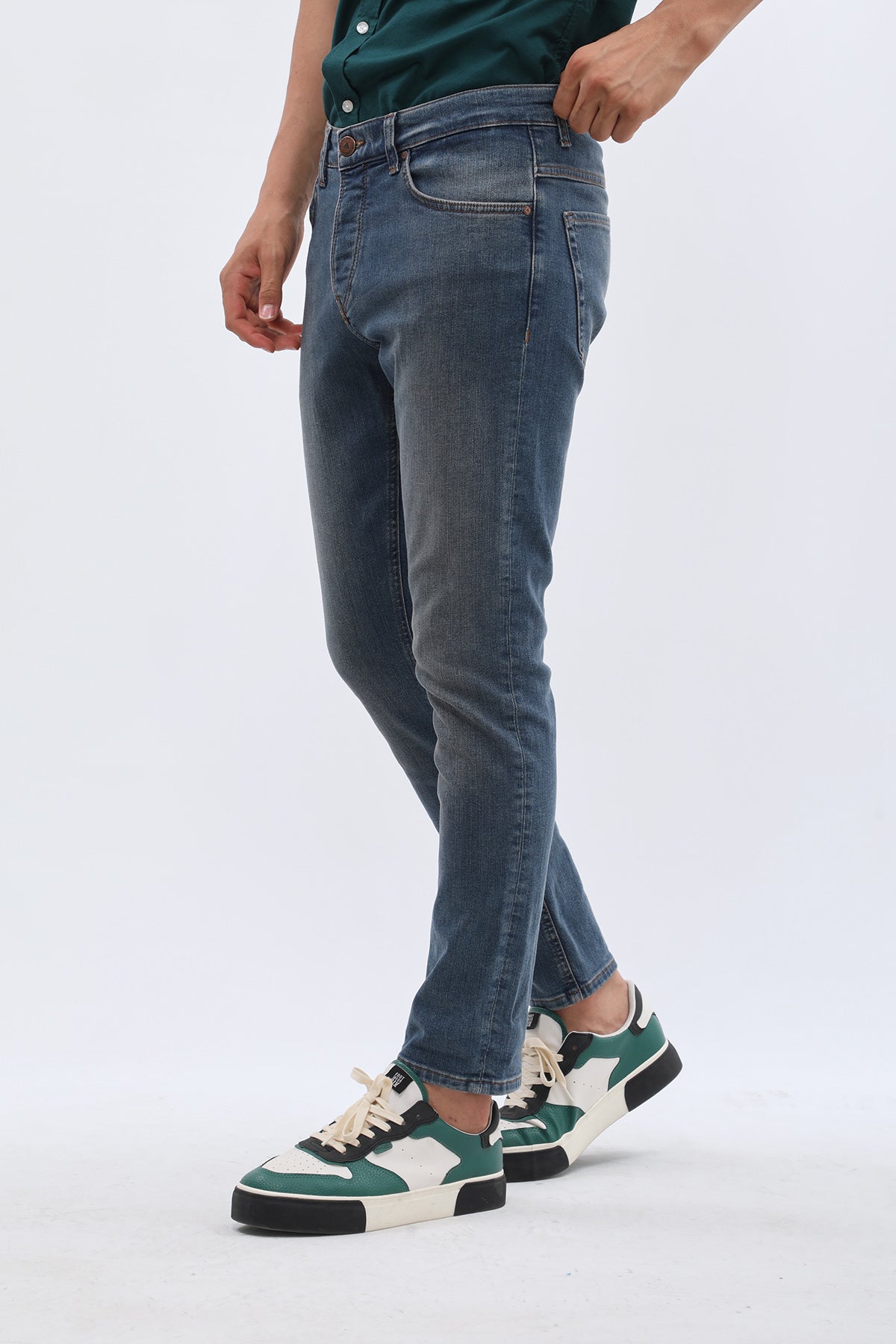 جينز Slim Fit من DNM UNITED - لون أزرق باهت