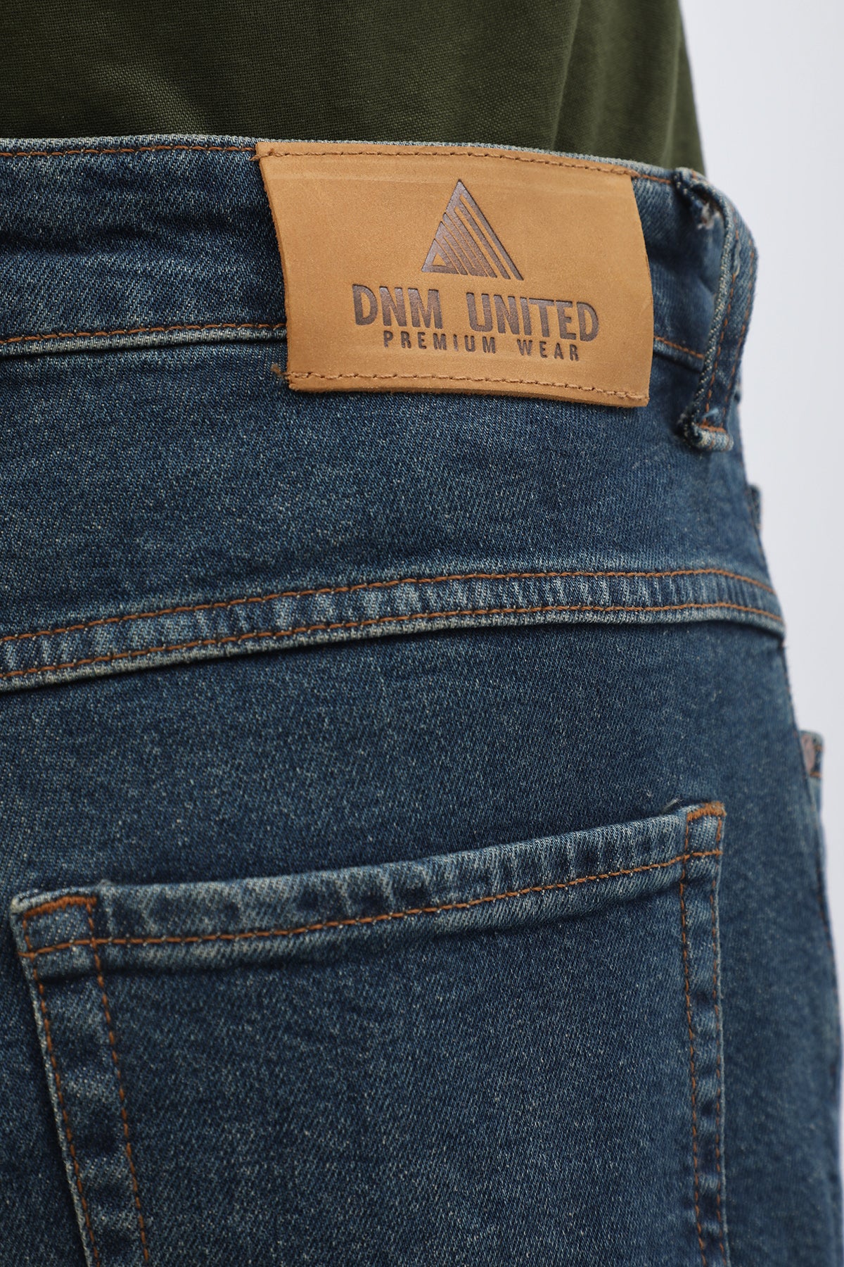 جينز Slim Fit من DNM UNITED - لون أزرق كلاسيكي