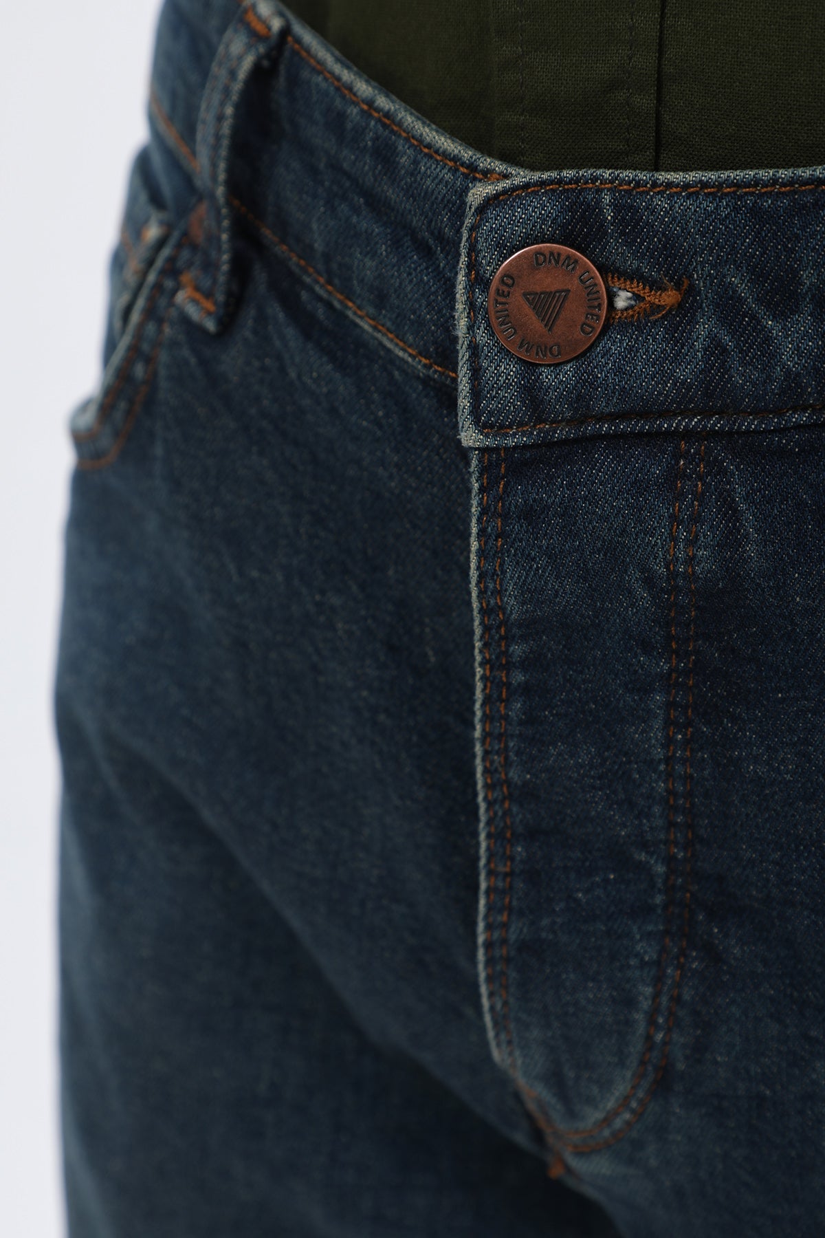 جينز Slim Fit من DNM UNITED - لون أزرق كلاسيكي