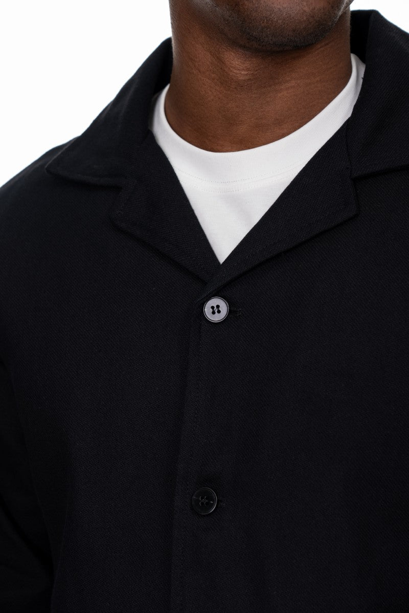 جاكيت قطني بأزرار وقصة مريحة - أسود