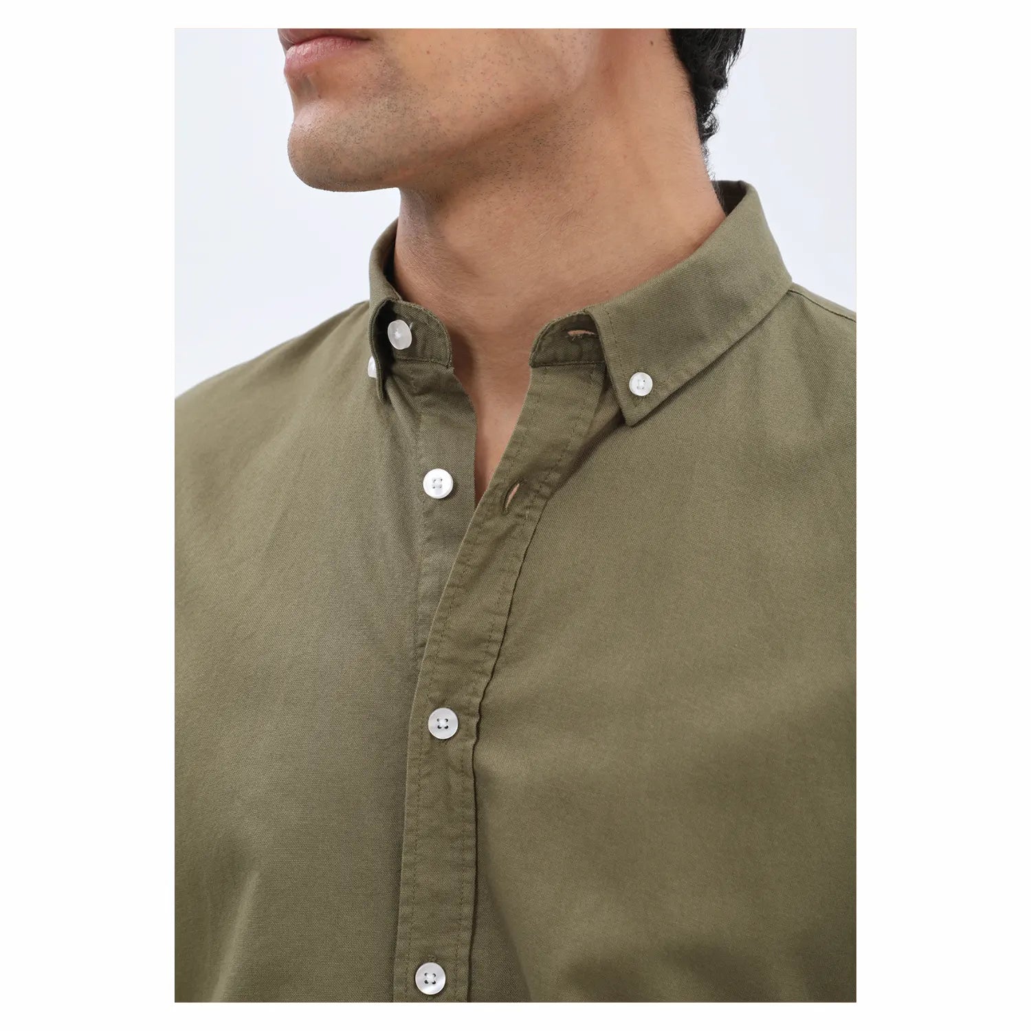 Classic olive green men’s Oxford shirt — clean cut, soft fabric, ideal for work or outings.