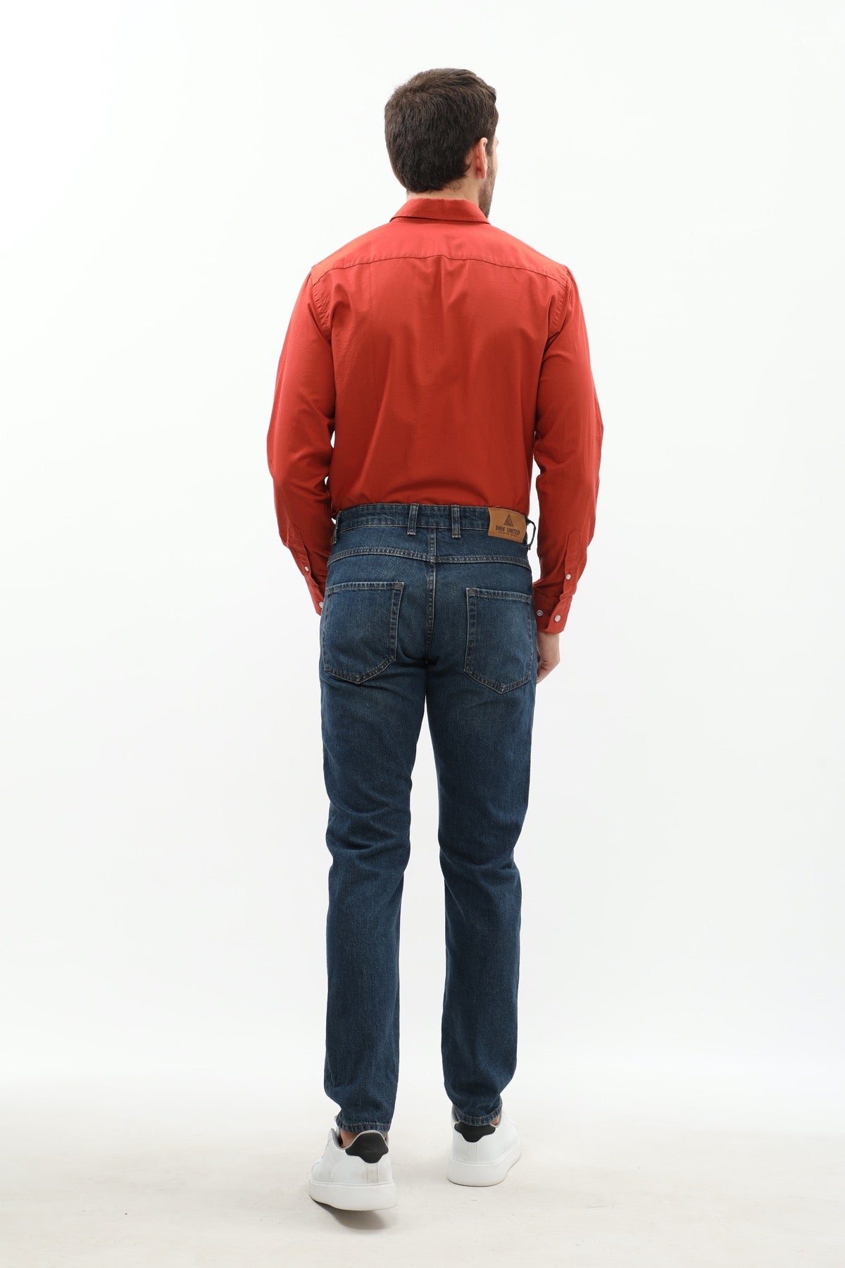 جينز Slim Fit من DNM UNITED - لون أزرق غامق باهت